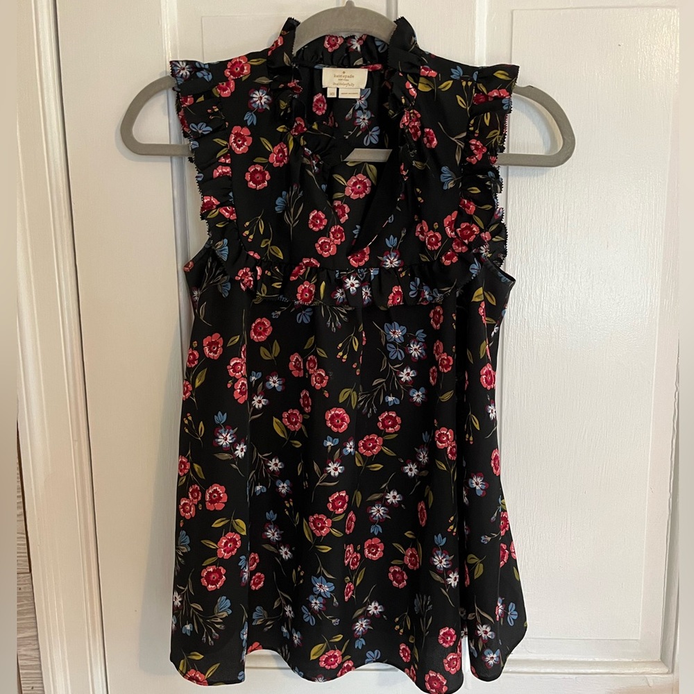 Women’s blouse with flower detail